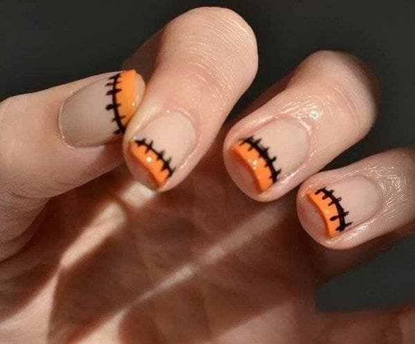 Colorful French manicure with bold tips and accent nails.