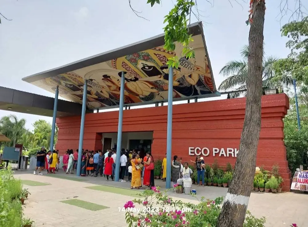 Front entrance of Eco Park with people lining up for entry