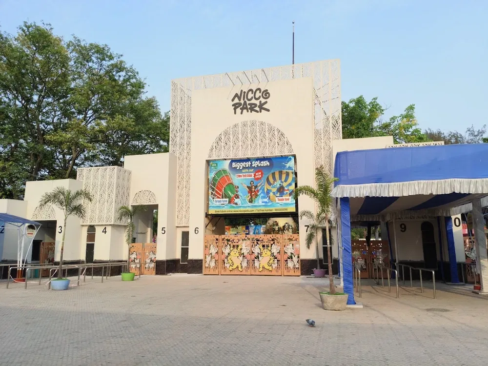 Entrance gate of Nicco Park with colorful decorations and ride posters